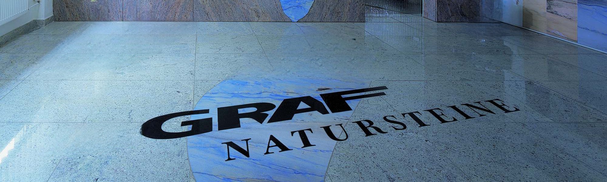 Bild Granitboden mit Schriftzug Graf Natursteine.